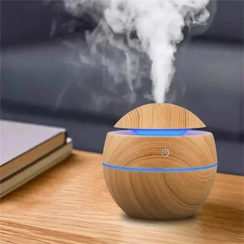 Diffuseur effet bois avec lumière bleue et brume