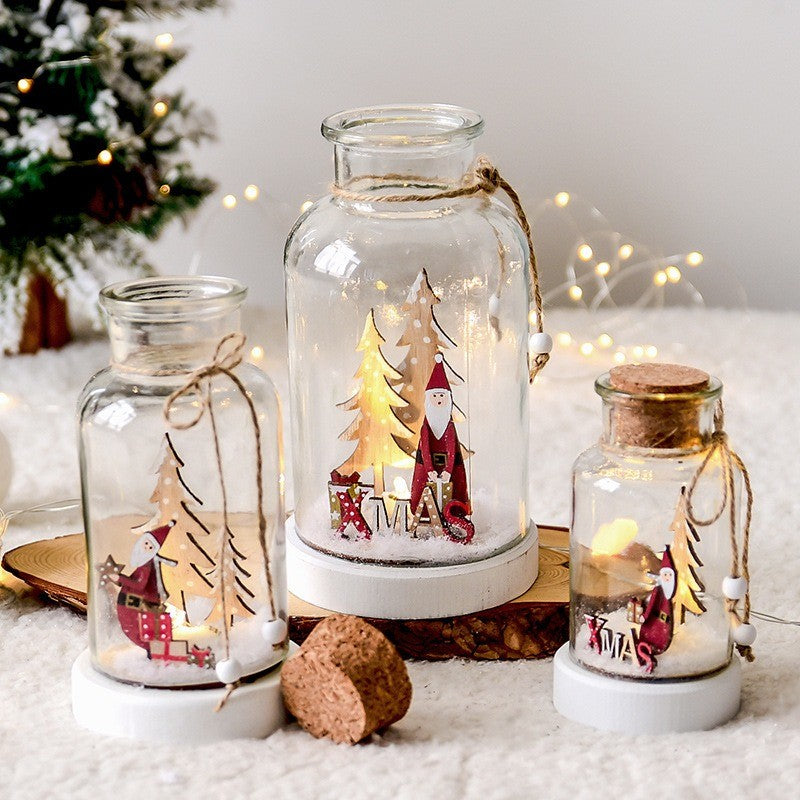 Bocaux à vœux lumineux avec scène de Père Noël sur fond blanc