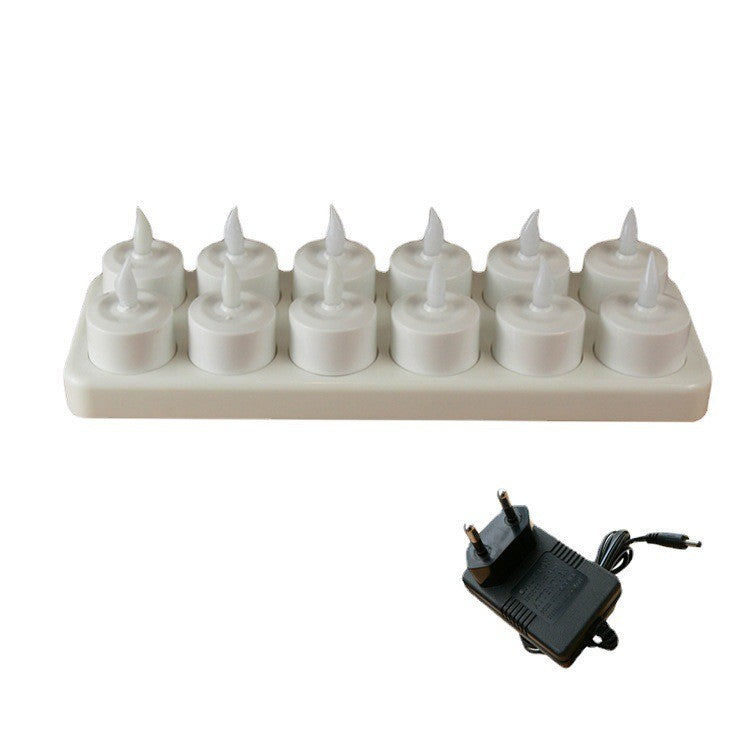 Bougies chauffe-plat LED rangées sur leur station de recharge blanche