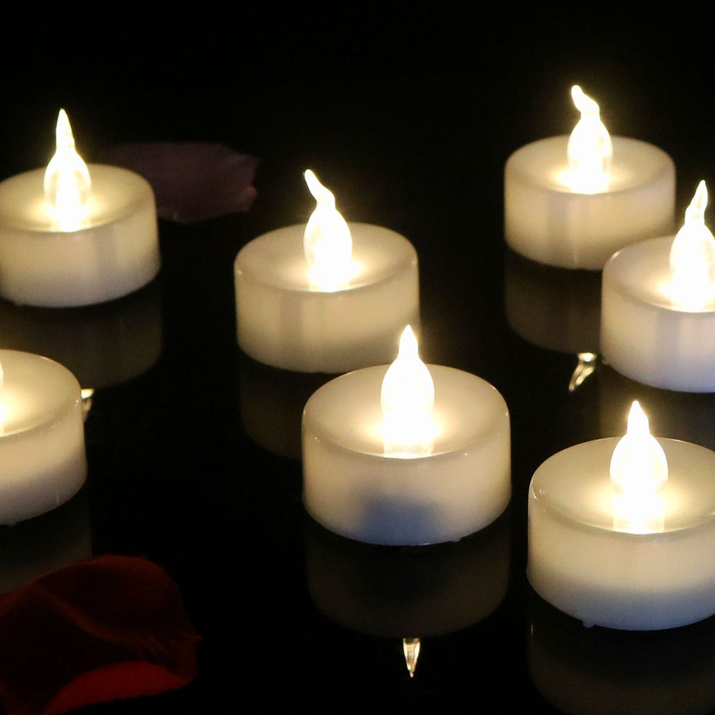 Bougies chauffe-plat LED allumées, flamme jaune vacillante