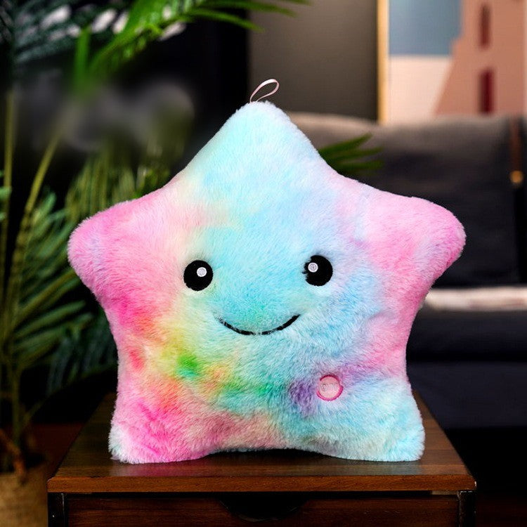 Coussin étoile lumineux LED aux reflets arc-en-ciel