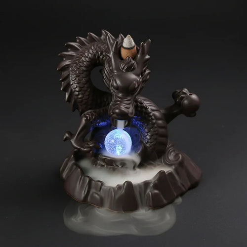 Brûleur dragon avec boule bleue et fumée