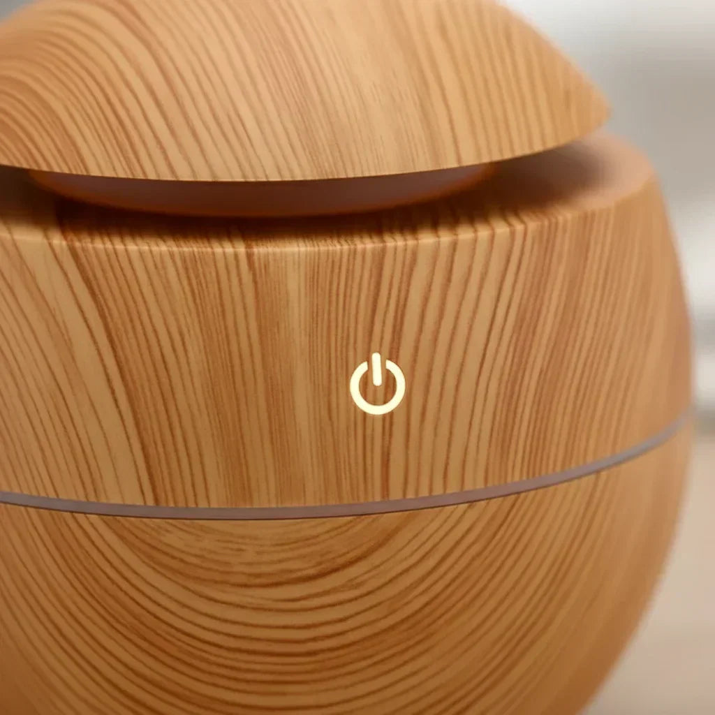 Bouton tactile du diffuseur effet bois