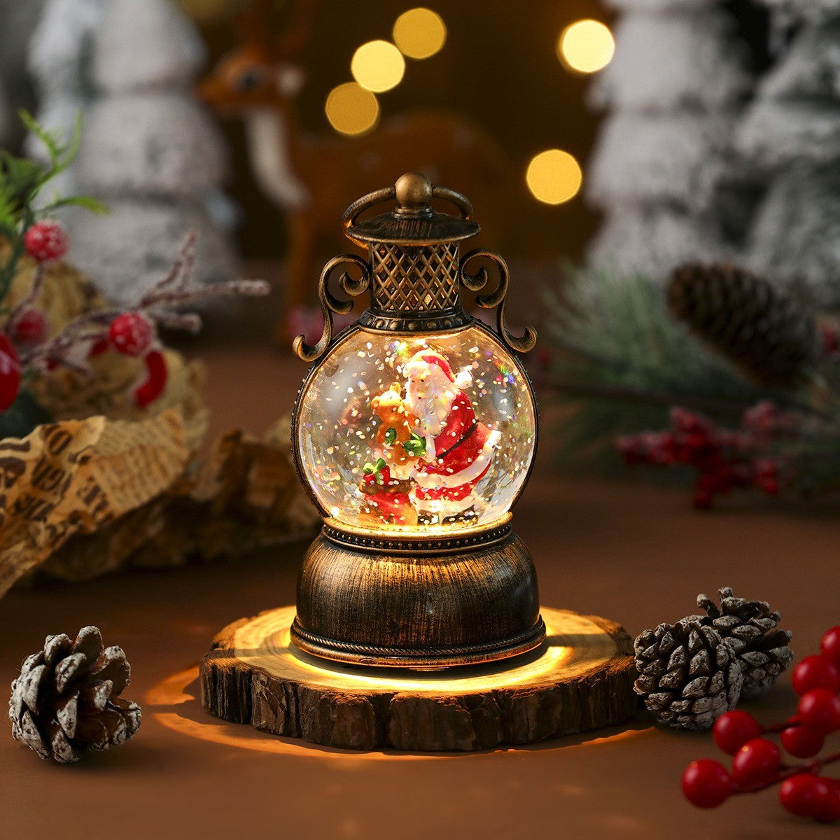 Lanterne boule à neige lumineuse avec Père Noël et son ourson, socle bronze