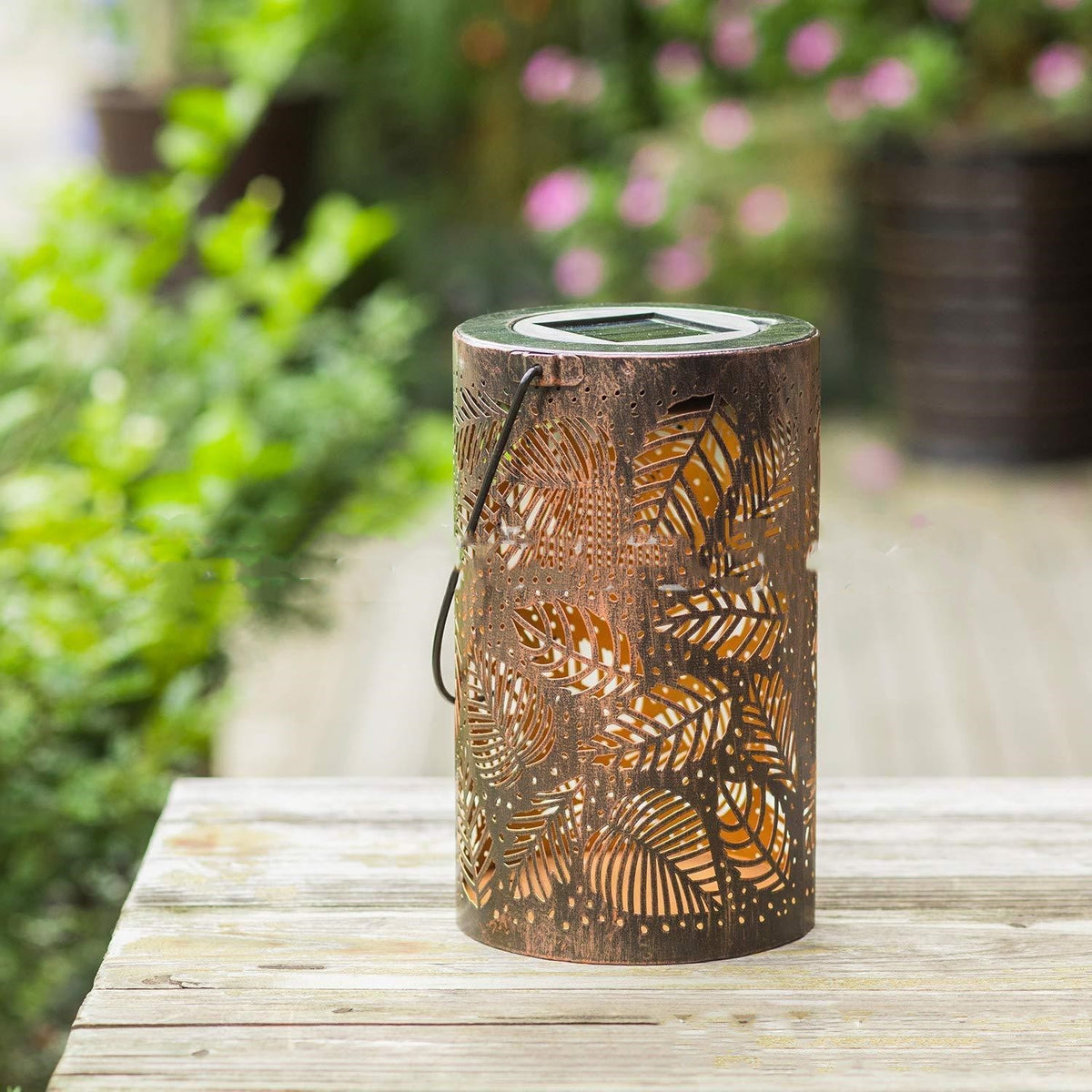 Lanterne solaire cylindrique bronze à motif de feuillage