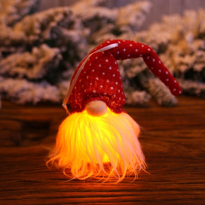 Lutin scandinave au bonnet rouge à pois, barbe lumineuse