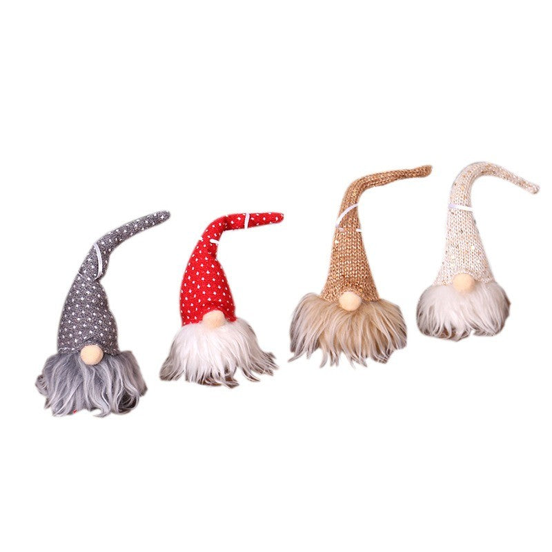 Quatre lutins scandinaves gris, rouge, beige et blanc