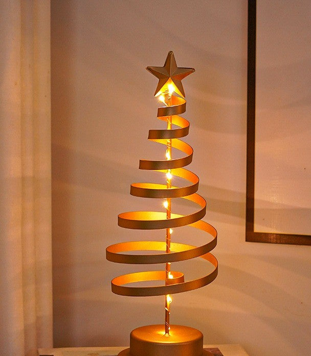 Sapin spirale en métal doré éclairé