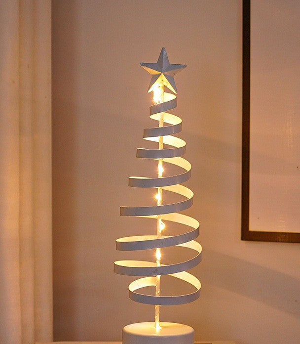 Sapin spirale en métal blanc éclairé