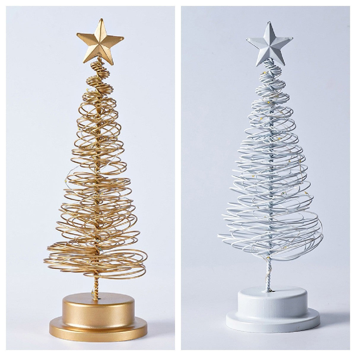 Sapins en fil de métal doré et blanc sur fond blanc