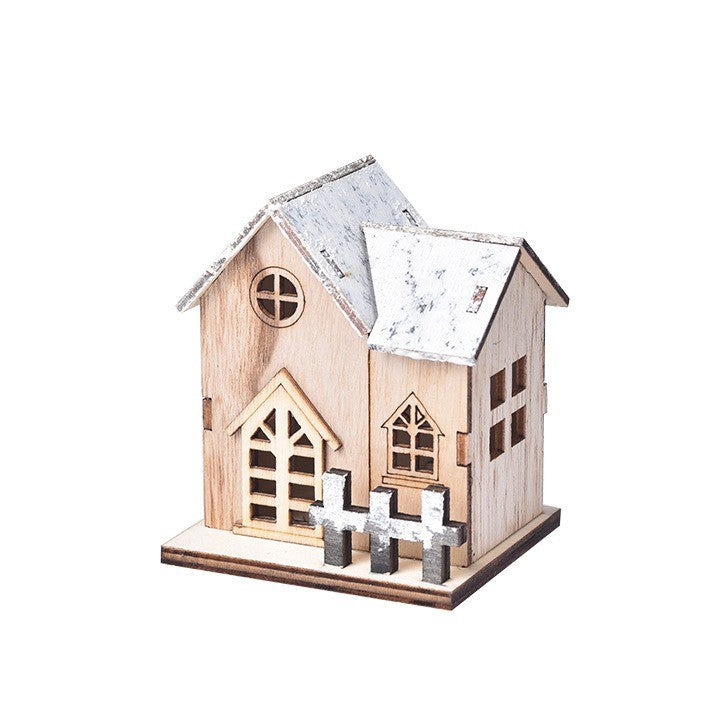 Maisonnette en bois naturel au toit blanc pailleté