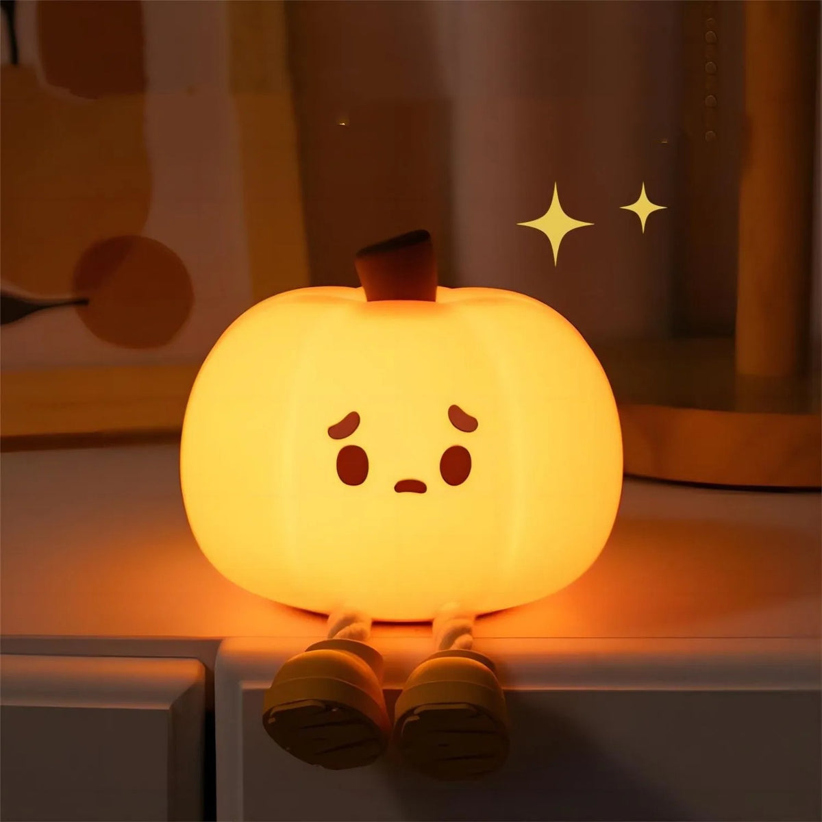Veilleuse citrouille en silicone allumée, lumière chaude et douce