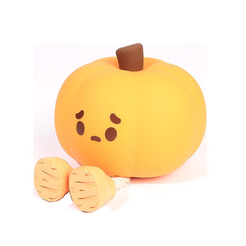 Veilleuse citrouille en silicone au visage mignon, sur fond blanc