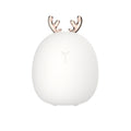 Veilleuse petit faon en silicone blanc, avec ses petits bois dorés