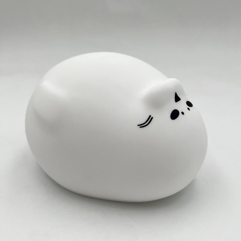 Veilleuse phoque en silicone blanc, allongé