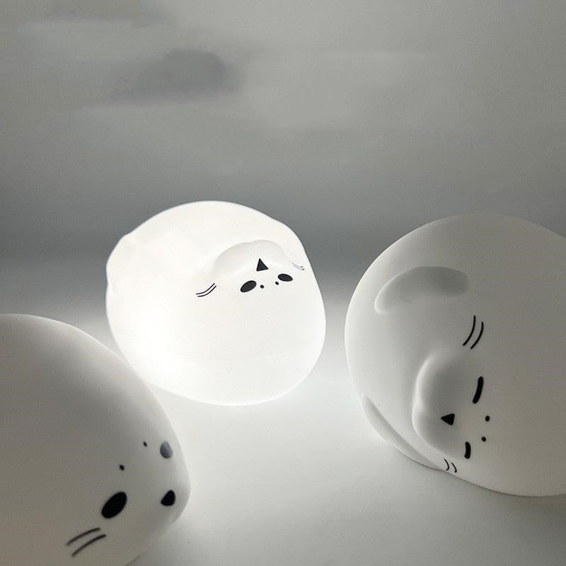 Veilleuses phoque allumées, lumière douce